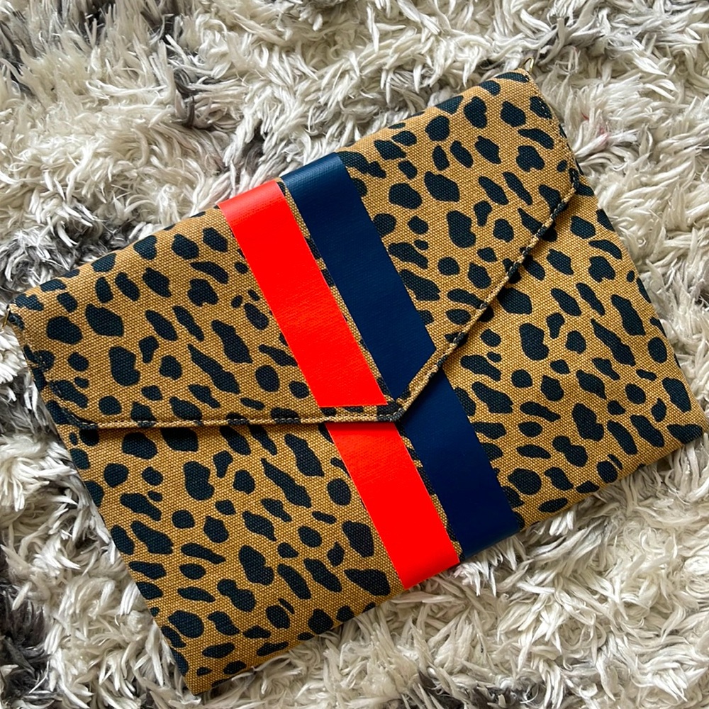 Stella & Dot leopard clutch with racing stripes magnetic closure - like new